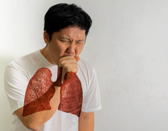 Man experiencing symptoms of lung cancer